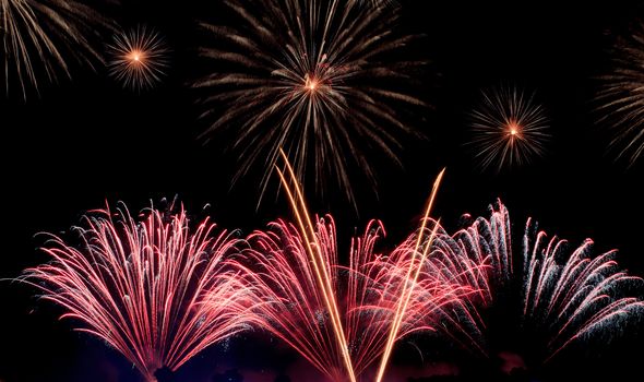 Exposure of multiple fireworks with a black sky.