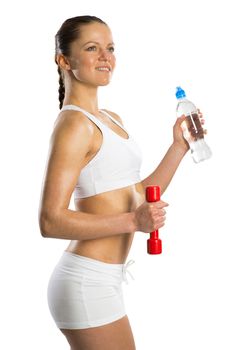 image of a young attractive sporty woman with red dumbbells and water bottle