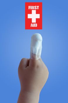 Finger of a children with first aid