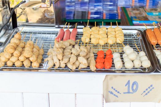 Meatball skewers placed and sold in a variety of markets.