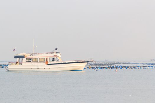 Small cruise ship anchored in the port.