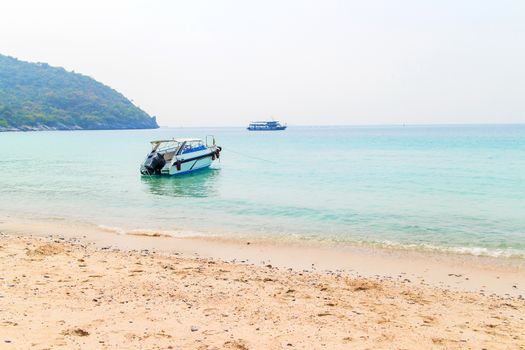 Speed boat in the landscape of sea.