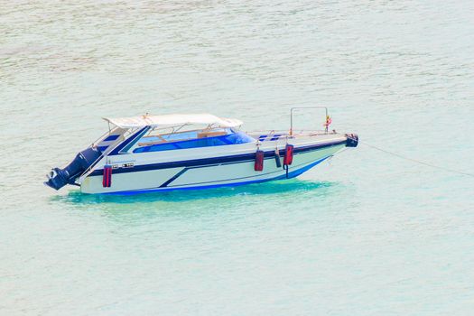 Speed boat in the landscape of sea.