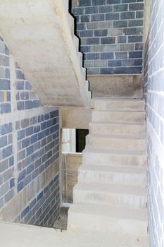 The way up stair are made from concrete.