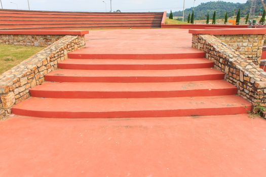 The way up stair are made from red concrete.