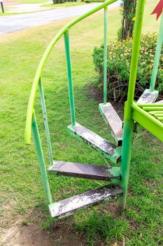 Way up iron stair in garden center.