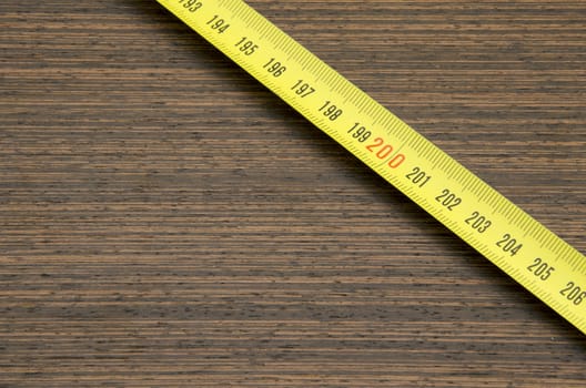 measuring scale on wooden background