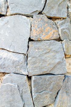 Walls built from natural stone for background image.