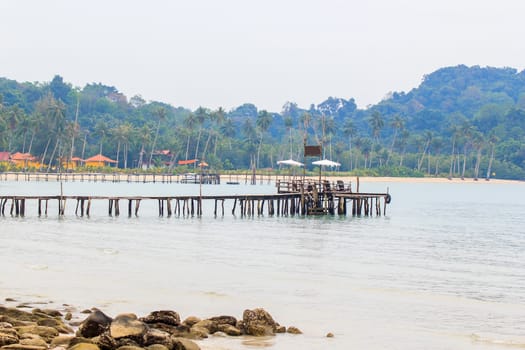 Wooden jetty over sea travel in the holidays.