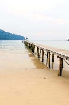 Wooden jetty over sea travel in the holidays.