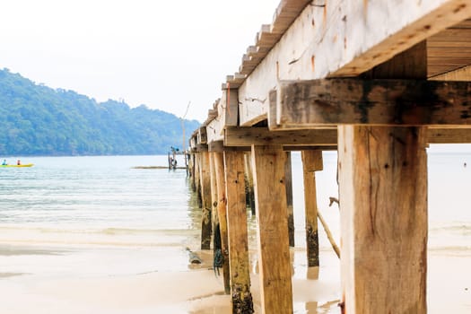 Wooden jetty over sea travel in the holidays.