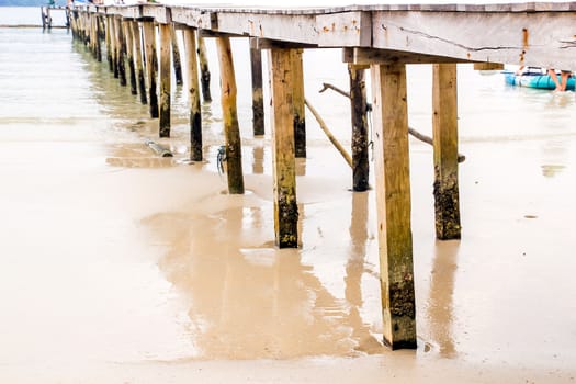 Wooden jetty over sea travel in the holidays.