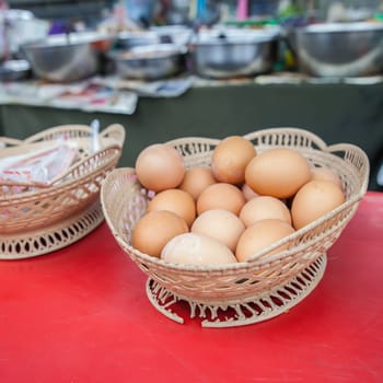 Carton of fresh brown eggs