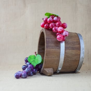 grapes on wooden bucket  still life 