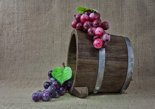 grapes on wooden bucket  still life 