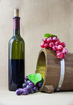 Red wine and grapes in vintage setting