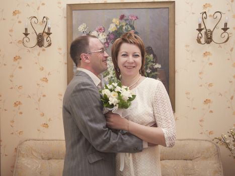 bride and groom are celebrating the wedding interior