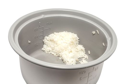 Stream rice in electric rice cooker isolated on a white background