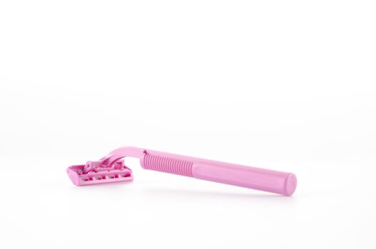 pink disposable shaving on a white background
