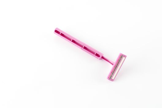 pink disposable shaving on a white background