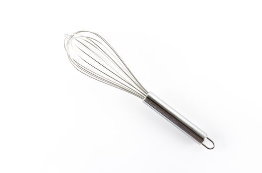 kitchen tools egg whisk on a white background