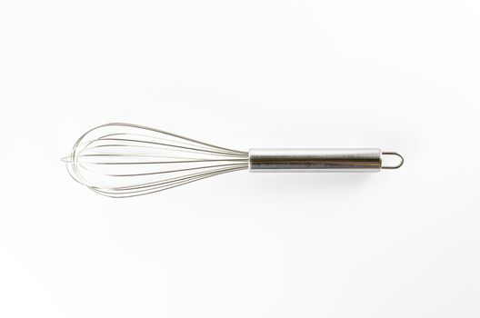kitchen tools egg whisk on a white background