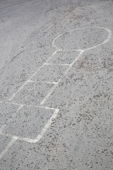 Hopscotch painted on the asphalt