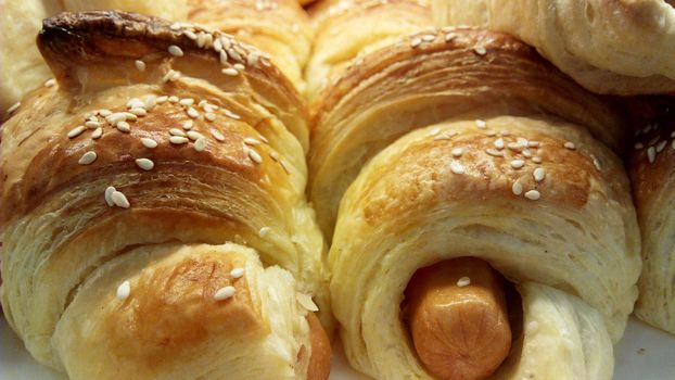 Close up photography of hotdog bread on the rack for sell.