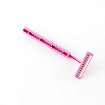 pink disposable shaving on a white background