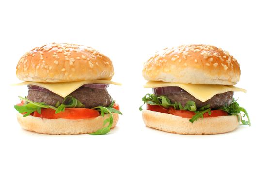 Quarter pounder cheeseburgers with tomatoes and onions 