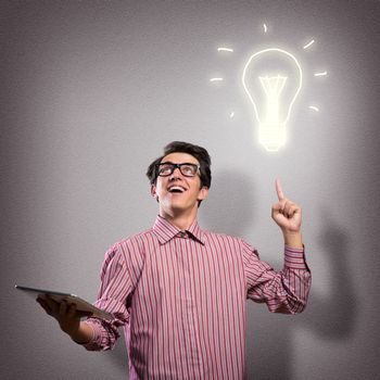 young man holding a tablet, hand up - the idea