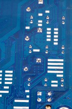 Macro Photo Of Electronic Circuit. Pcb On The Lighting.