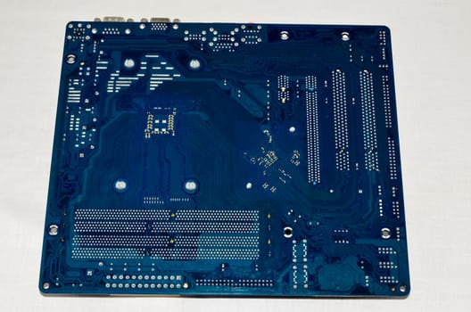 Macro Photo Of Electronic Circuit. Pcb On The Lighting.