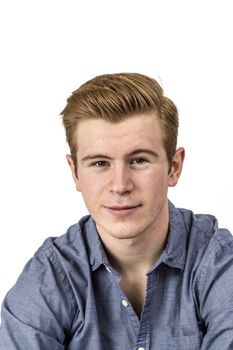 portrait of cool boy with red hair posing in studio