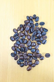 coffee beans on wood background