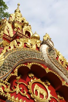 stucco work in thai art that usually decorated with mirror and precious stone or gold leaf,Chiang rai temple,Thailand