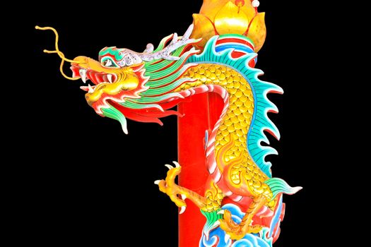 Dragon statue on black background