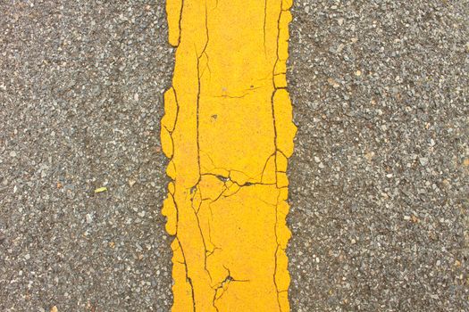Asphalt dark texture with yellow lines