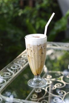 one cup of iced cappuccino,shallow focus