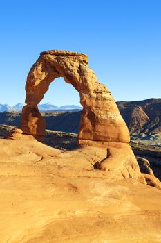 Vertical view of famous Delicate Arch at sunset, USA 