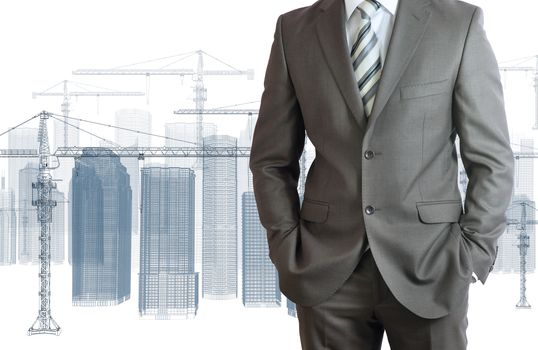 Businessman in suit. Wire frame tower crane and skyscrapers on the background