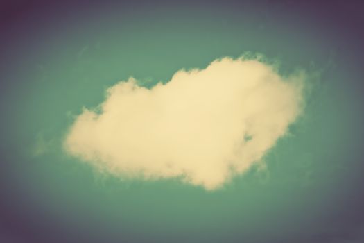 A single cloud on clear sky. Retro, vintage style. Concept
