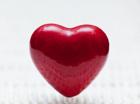 Red heart shape on wicker. Symbol of love, Valentine's Day.