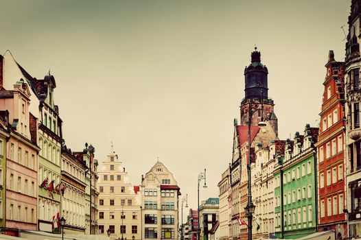 Wroclaw, Poland. The market square with historical buildings and St. Elizabeth's Church. Silesia region. Vintage, retro style