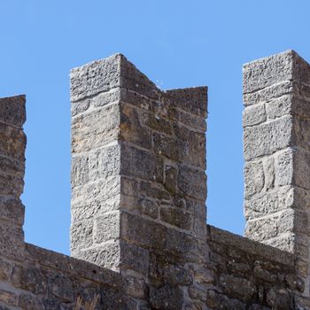 Wall detail of medieval fortress. San Marino, Europe.