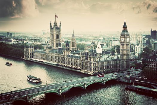 London, the UK. Big Ben, the Palace of Westminster in vintage, retro style. The icon of England. View from the London Eye