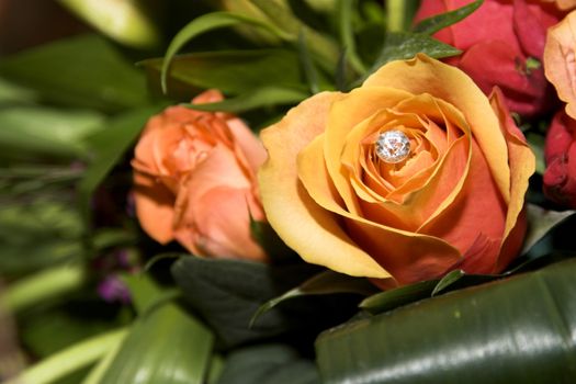 Wedding Table flower arrangement with orange roses