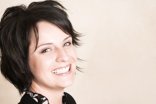 Studio shot of female brunette, head and shoulders