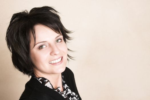 Studio shot of female brunette, head and shoulders