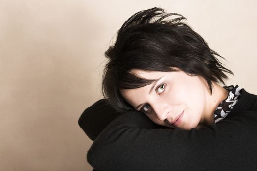 Studio shot of female brunette, head and shoulders